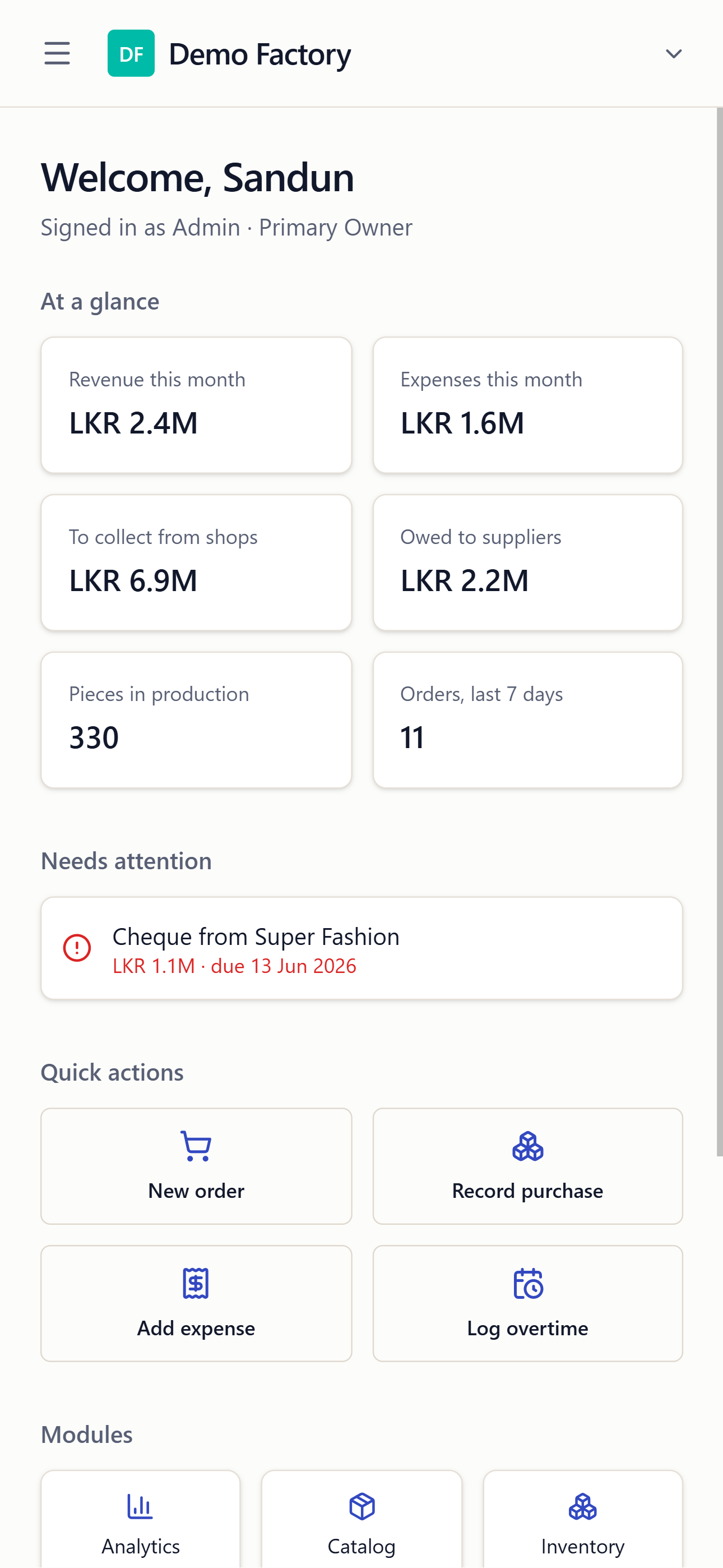 StitchMatrix garment factory dashboard on a mobile phone